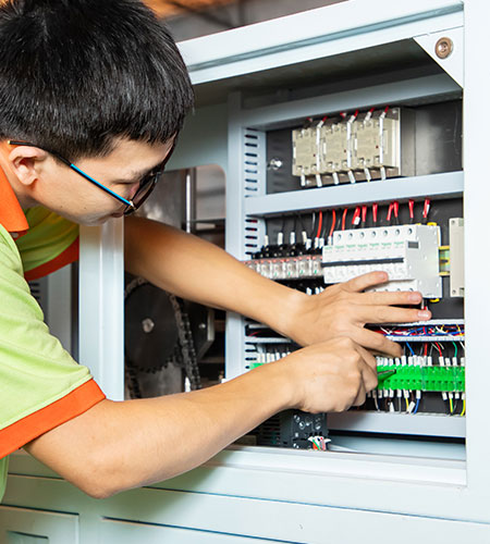 A worker is assembling the circuit