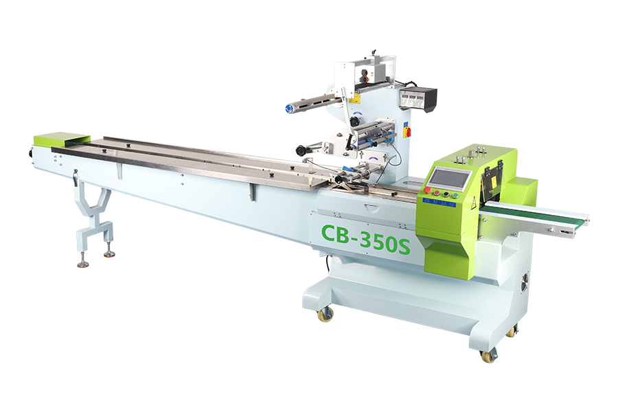 a top film roll flow pack machine with rotary jaws module 350s