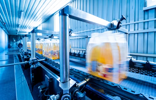 modern-strapping-and-transporting-machine-for-packaging-line-at-beverage-plant